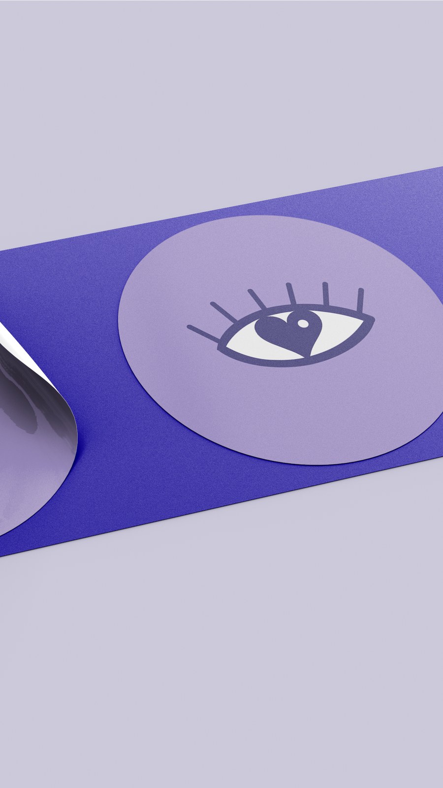 Creativa y Próspera eye and heart logo printed as round violet stickers