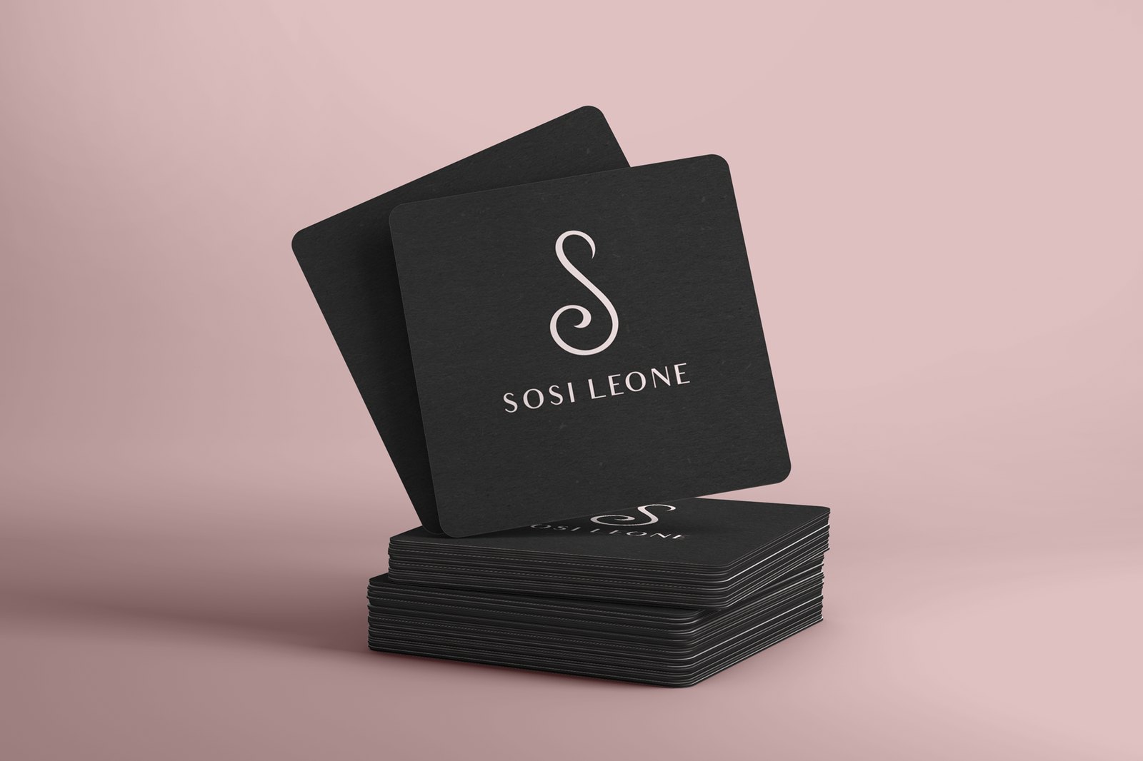 Sosi Leone cards in black with the S monogram on a blush background